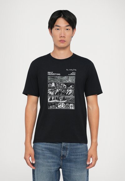 Schwarzes Baumwoll-T-Shirt mit einem weißen Druckgrafik, die umreißende Illustrationen und Text zeigt, Rundhalsausschnitt und kurzen Ärmeln. Lässiger Schnitt.
