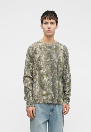 - Bluzka z długim rękawem