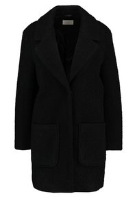 Manteau d'extérieur noir texturé avec un col à revers, deux poches avant et une coupe légèrement ample. Dispose d'une doublure intérieure lisse.