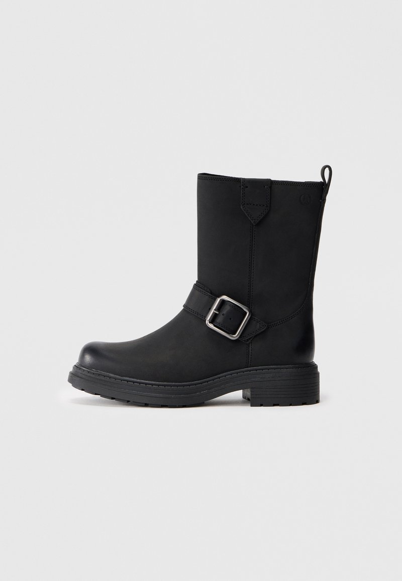 Black ankle boots with a smooth leather texture, featuring a decorative strap and silver buckle, robust rubber sole, and round toe design.