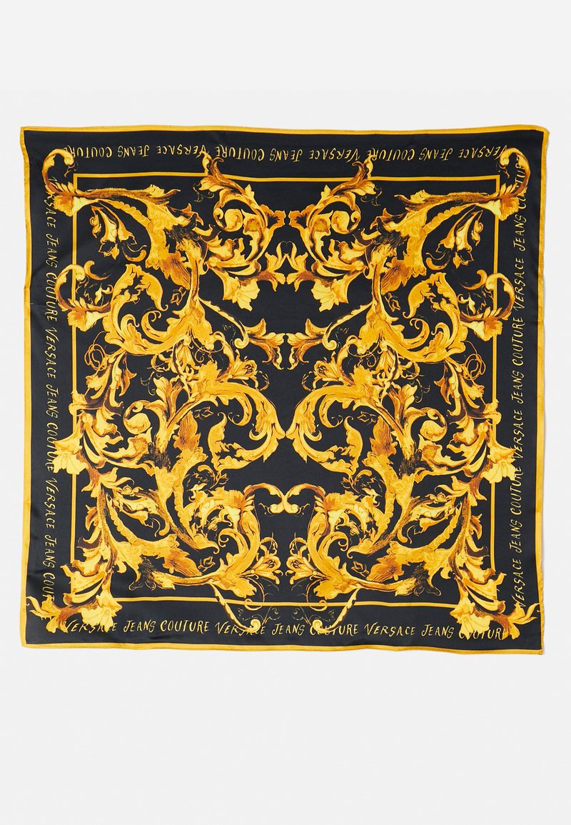 Svart silkeslær med intrikate gull barokk mønstre, aksentert med teksten "Versace Jeans Couture" langs kantene.