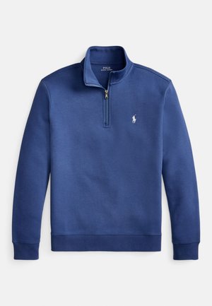 Blue quarter-zip sweatshirt with stand collar, long sleeves, ribbed cuffs and hem, and small white embroidered logo on chest.