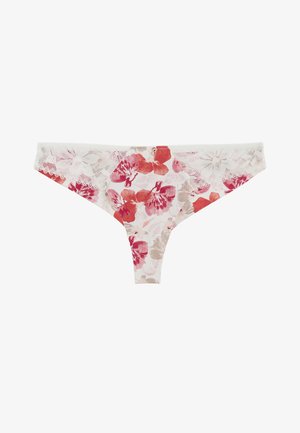 String blanc avec imprimé floral rouge et beige et bordure en dentelle blanche à la taille, ornée de deux petits boutons décoratifs.