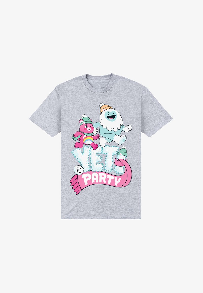 Camiseta gris con personajes de dibujos animados: un oso rosa y un yeti azul, con gorros de invierno, y el texto "YETI A LA FIESTA" en negrita rosa y azul helado.