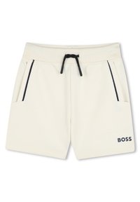 Shorts couleur crème en tissu texturé, avec une taille élastique, un cordon de serrage noir et des poches latérales, arborant un logo "BOSS" en marine.