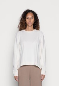 Marc O'Polo DENIM RAGLAN LONGSLEEVE SLITS AT SIDESEAM - Camisola - pistachio shell