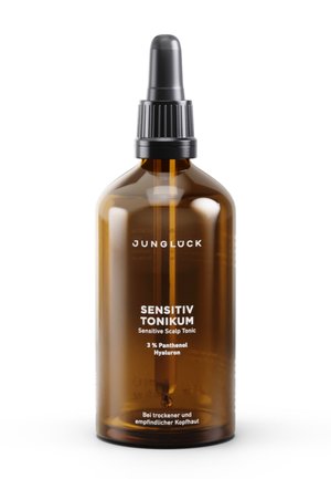 Brown glass bottle with a black dropper cap. Label displays "Sensitiv Tonikum," "Sensitive Scalp Tonic," and ingredients in clear font.