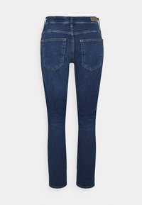 Mörkblå skinny jeans i denim, med fem fickor, normal midja och en ren finish utan synliga slitningar eller dekorationer.