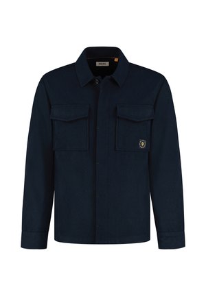 Camicia button-up blu navy realizzata in tessuto testurizzato con due tasche sul petto e cuciture verdi. Presenta un colletto classico e un patch del marchio.
