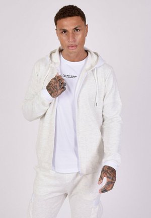 EN TEXTURÉ ET DETAILS ÉLASTIQUE - Felpa con zip - blanc