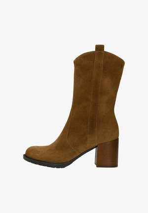 Brown suede ankle boot with a rounded toe, enhanced by a textured block heel and side stitching details.
