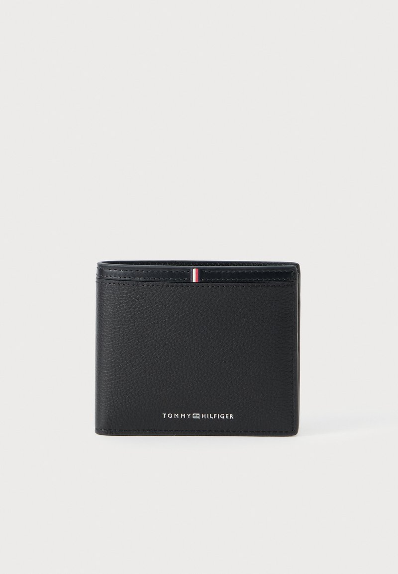 Black leather wallet with a textured finish, featuring a subtle red, white, and blue accent and embossed brand logo on the front.