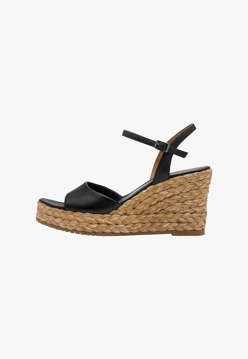 Sandale compensée en cuir noir avec une semelle en jute tressé, dotée d'un bout arrondi et d'une bride à la cheville. Hauteur importante et détail texturé sur la semelle compensée.