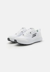White athletic shoes with textured mesh upper, gray accents, flat laces, and a rubber sole featuring small traction studs.