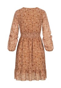Robe brune à manches courtes avec une taille smockée, un ourlet volé et un tissu semi-transparent. Caractérisée par de petites fleurs blanches et beiges.