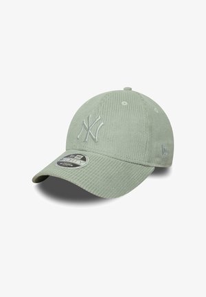 Light green corduroy baseball cap with New York Yankees logo embroidered on the front and curved brim.