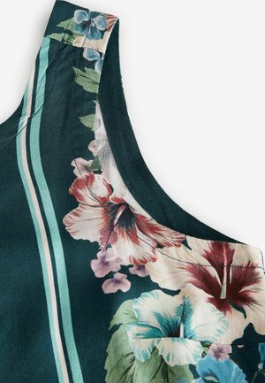 Tejido floral verde con grandes hibiscos y pequeñas flores; incluye rayas turquesas. Textura suave, diseño sin mangas.