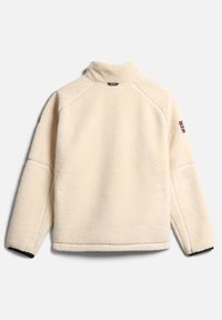 Fleece pullover in off-white with high collar, raglan sleeves, and black cuffs. Features a logo patch on the right sleeve. Soft texture.