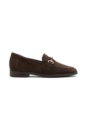 Brown suede loafer with a flat heel, featuring a gold-tone hardware accent on the vamp and stitched detailing along the edges.