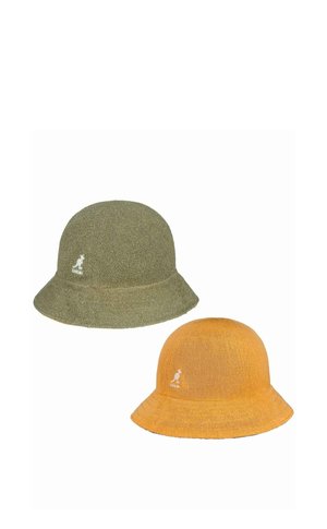 Two Kangol bucket hats displayed side by side, one olive green with a textured fabric, the other mustard yellow with a knitted texture.