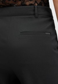 AllSaints LACEY  - Stoffhose - black