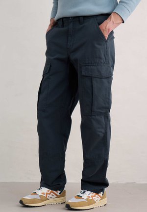 Navy blue cargo pants with front and side pockets, made of durable fabric, featuring a straight-leg design and subtle stitching details.
