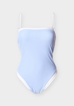 Ολόσωμο μαγιό σε ανοιχτό μπλε χρώμα με λεπτές λευκές ρυθμιζόμενες τιράντες και λευκή διακόσμηση κατά μήκος του πάνω μέρους και των ανοίγματων στα πόδια.