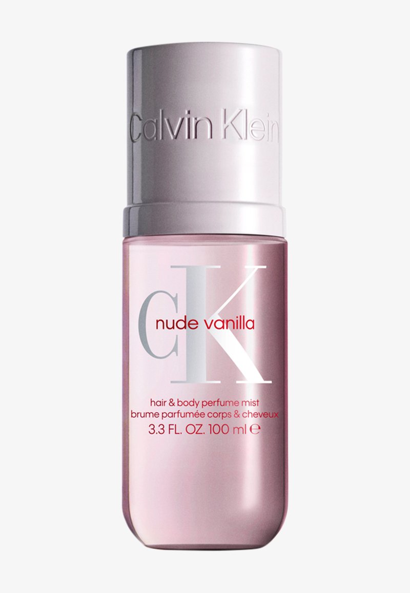 Calvin Klein Nude Vanilla hair and body perfume mist bottle, pink with silver cap, 100 ml, labeled with brand and product details.