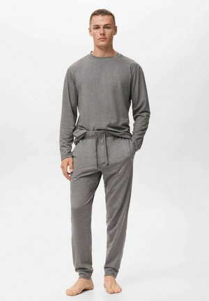 Grau Hausanzug-Set bestehend aus einem Langarmshirt und Pants mit Kordelzug, gefertigt aus weichem Stoff mit einer lockeren Passform und gerippten Bündchen.