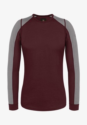 Burgunderfarbenes Langarmhemd mit grauen Raglanärmel, glatter Textur, Rundhalsausschnitt und taillierter Passform. Verfügt über kontrastierende Schulterakzente.