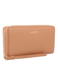 Brown textured leather wallet with a gold zipper, featuring a wrist strap and embossed brand logo on the front.