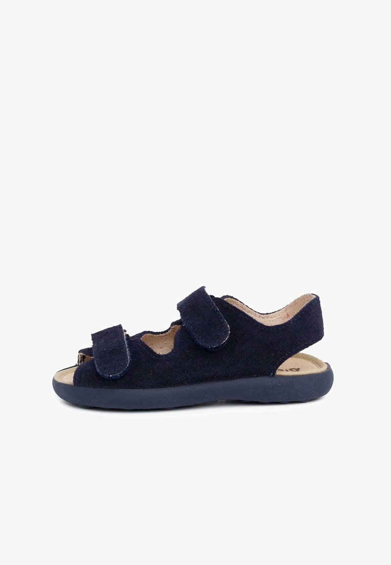 Navy blue suede sandal with two adjustable Velcro straps, open toe design, and a cushioned insole on a flexible rubber sole.