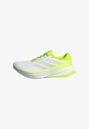 Running shoe in white with neon yellow accents. Features a textured mesh upper, flat laces, and a lightweight sole.