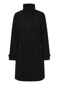 Cappotto nero di lunghezza media realizzato in un misto lana, con colletto alto, due tasche con zip e maniche arrotolate. Texture liscia con cuciture sartoriali.