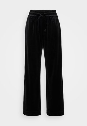 Pantaloni largi din catifea neagră cu talie elastică și șnur, având o textură netedă și o croială relaxată, concepuți pentru confort.