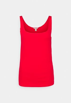 Camiseta sin mangas roja con escote redondo, mostrada plana sobre un fondo blanco.