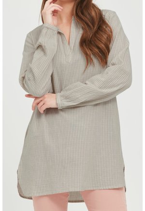 Tunikaer - brown