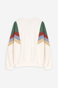 Εκρού φούτερ με μακριά μανίκια που διαθέτει πράσινες, κόκκινες, μπλε και μπεζ λοξές ρίγες στο πάνω μέρος των μανικιών, εμφανιζόμενο από πίσω.