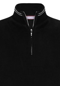 Mustaline tõmblukuga pullover kõrge kaelusega, millel on hõbedane tõmblukk ja valged triibud. Pehme tekstuuriga kangas, puhas kaelus.