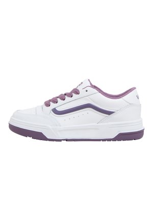 White sneakers with purple accents, featuring a smooth leather upper, rounded toe, and textured rubber sole. Six lace eyelets and branding at the heel.