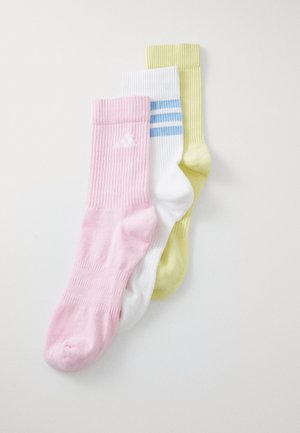 Três pares de meias de algodão: rosa, brancas com riscas azuis e amarelo claro. Cada um apresenta textura ribeteada e sola acolchoada.