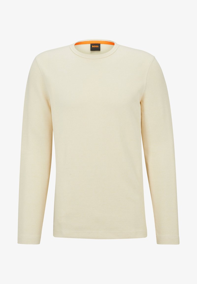 Long-sleeve beige ribbed t-shirt with a round neck and contrasting orange trim inside the collar. Made from soft, textured fabric.
