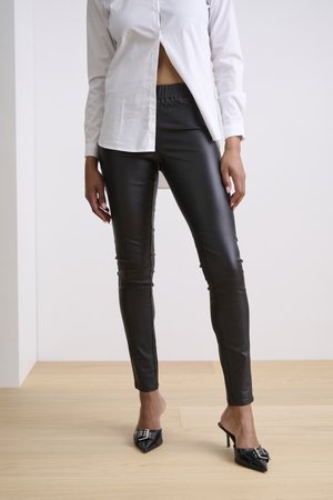 KAADA - Leggings - Trousers - black deep