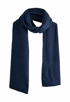 Dark blue knitted scarf folded in a loop with two long ends hanging down against a white background.