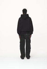 Pegador Luvtröja - black