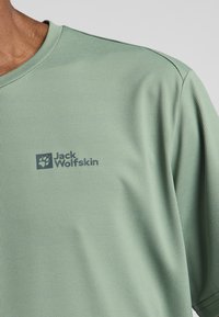 Jack Wolfskin DELGAMI S/S  - T-Shirt sport - eucalyptus