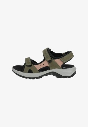 Groene en roze sandalen met verstelbare straps, een zwarte gevoerde binnenkant en een dikke grijze zool met een gestructureerd profiel.