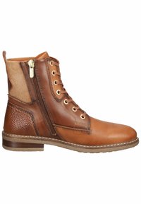 Bottine en cuir marron avec lacets, fermeture éclair latérale, panneau de talon texturé et semelle basse empilée.