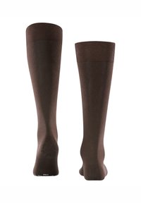 Calzini marroni fino al ginocchio con una texture liscia, polsini a coste e un tallone rinforzato. Colore uniforme e nessun motivo o dettaglio visibile.