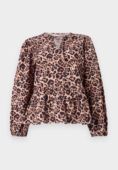 Top peplum con stampa leopardata, maniche lunghe, scollatura rotonda e dettaglio a chiave. Realizzato in tessuto morbido con una finitura testurizzata.